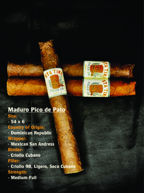 Statiki Cigar Co. Maduro Pico de Pato cigars on a dark background, showing the dark Mexican San Andres wrapper and tiki-style band.